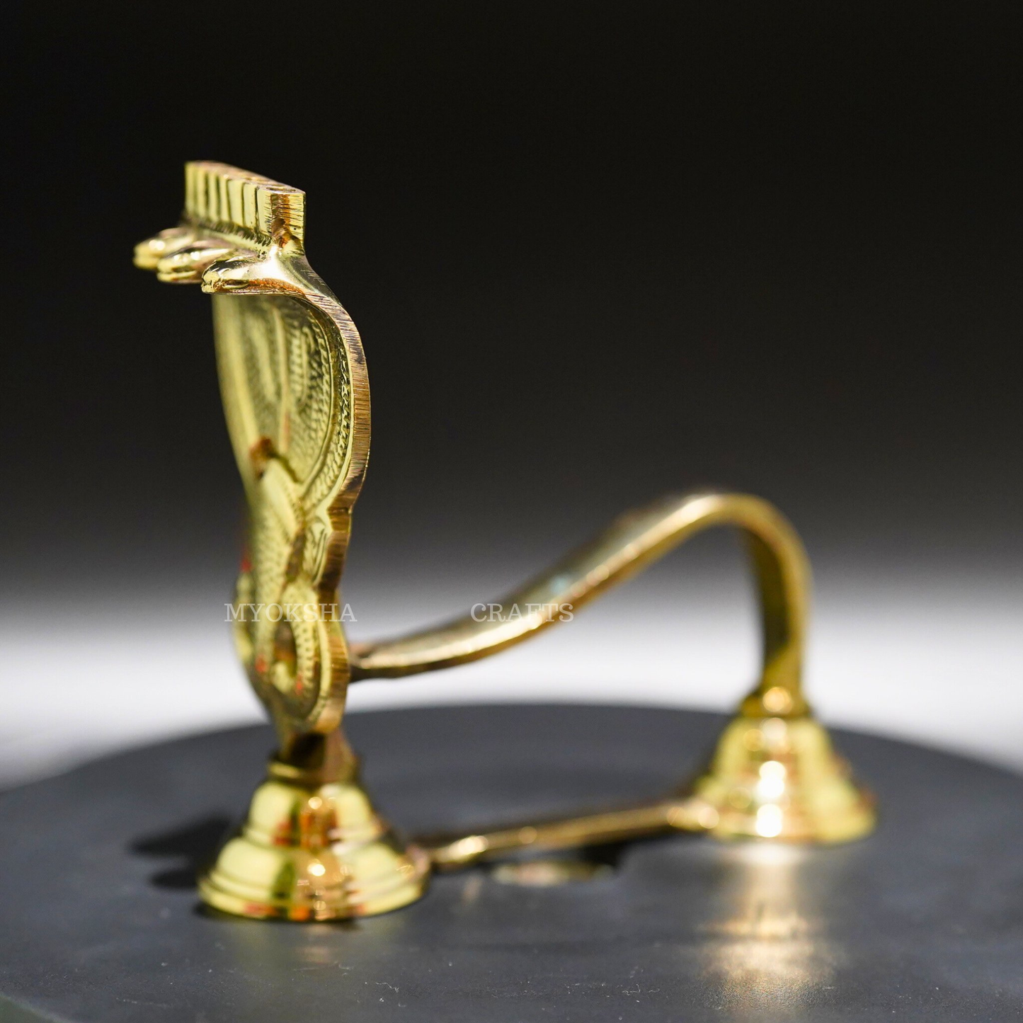 https://cdn.shopify.com/s/files/1/1857/6931/products/1688619511328_brass_naga_arti_MC00039_282_29_71201c55-43ea-4d60-b121-82715c45f73d.png?v=1753184054
