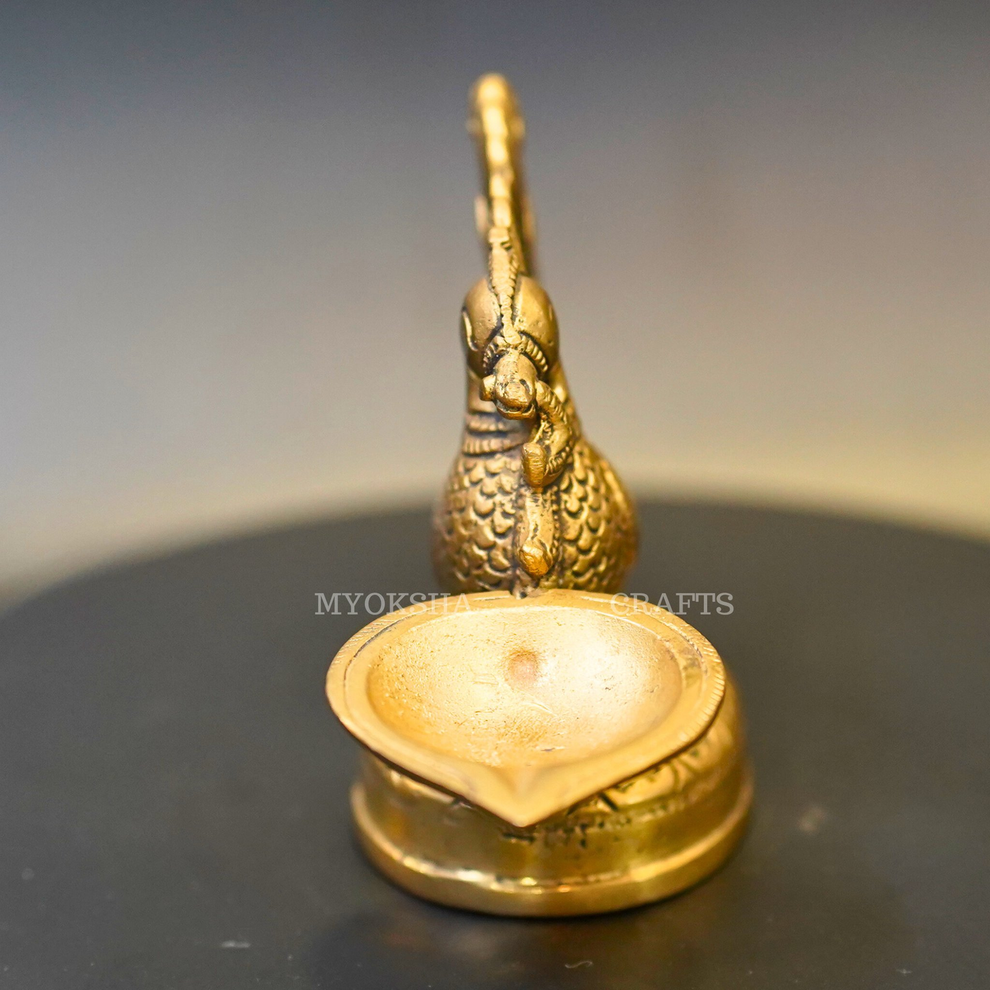 https://cdn.shopify.com/s/files/1/1857/6931/products/1692685784692_peacock_diya_MC00327_282_29.png?v=1753181989