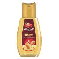 https://cdn.shopify.com/s/files/1/1857/6931/products/Dabur-Almond-Hair-Oil.png?v=1706969174