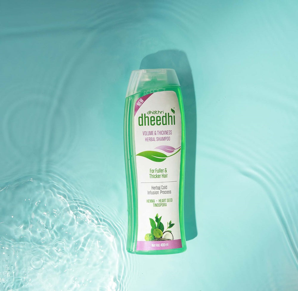https://cdn.shopify.com/s/files/1/1857/6931/products/DhathriVolumeAndThicknessHerbalShampoo.jpg?v=1627007430