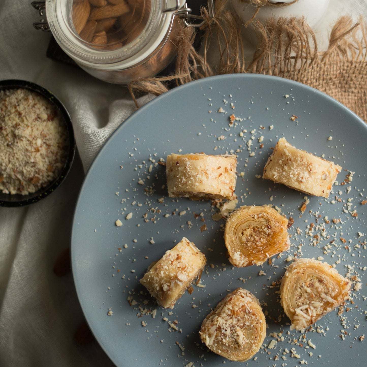 https://cdn.shopify.com/s/files/1/1857/6931/files/FLAKYALMONDTURKISHROLL.jpg?v=1765199023