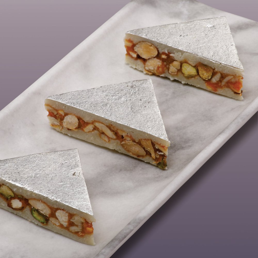 https://cdn.shopify.com/s/files/1/1857/6931/files/KajuSandwich.png?v=1785672189