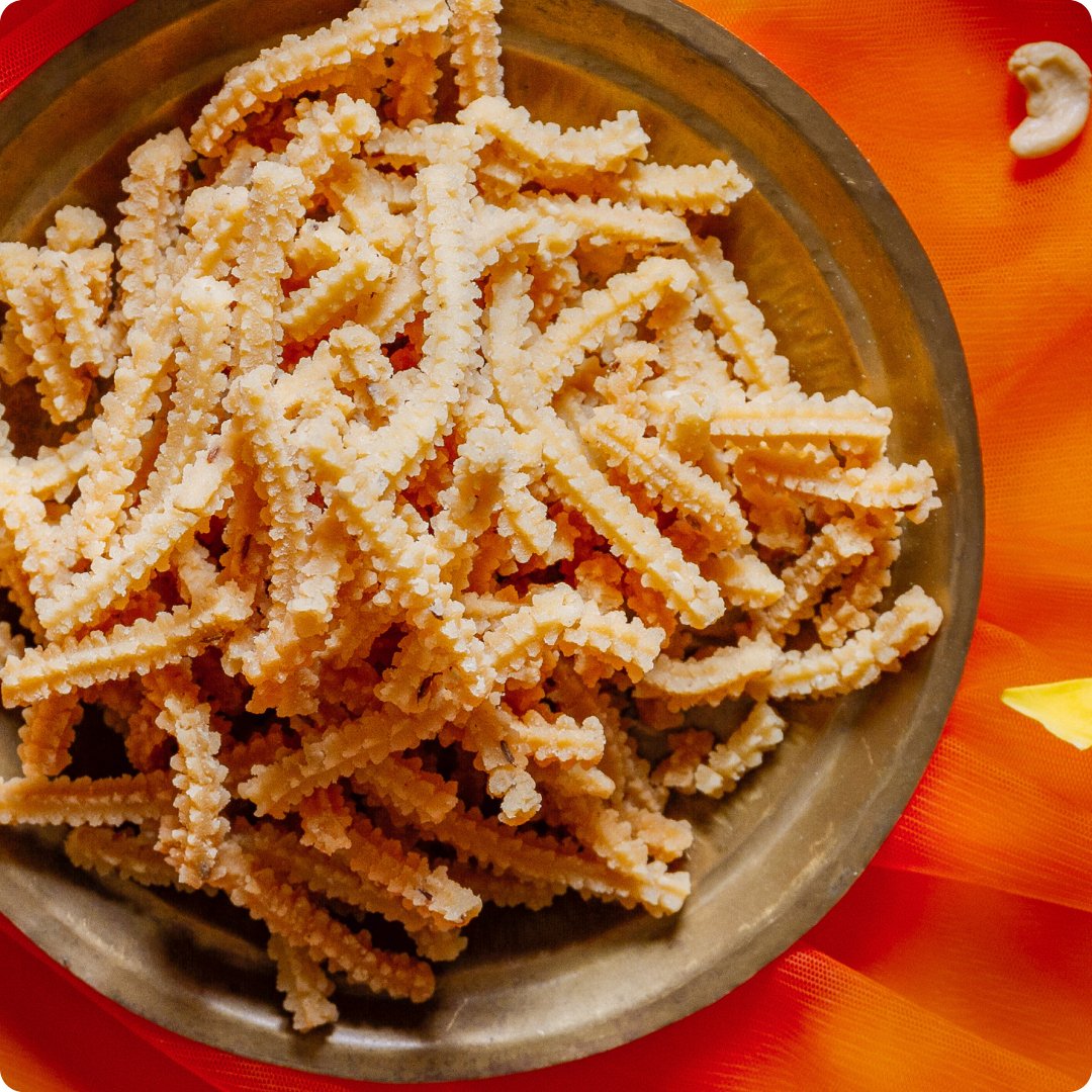 https://cdn.shopify.com/s/files/1/1857/6931/files/butter-murukku-714188.jpg?v=1762169454