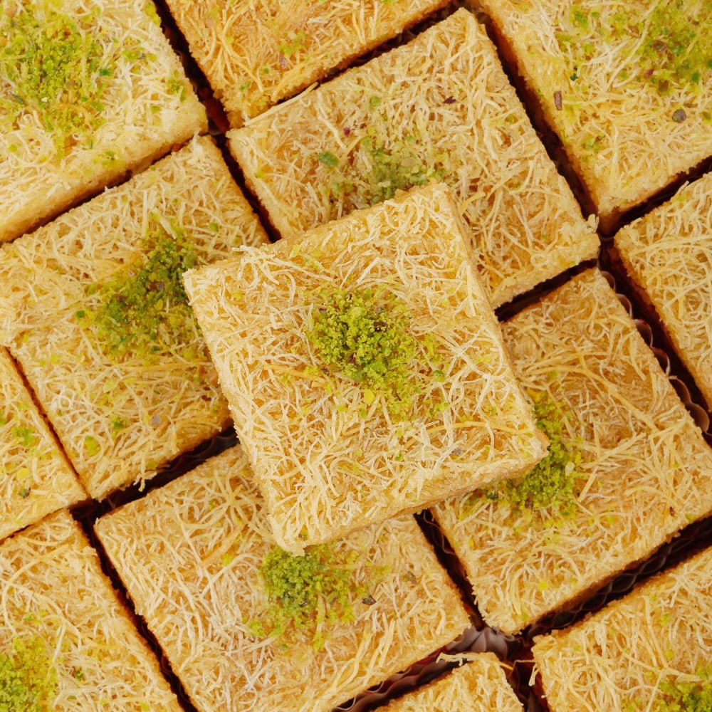 https://cdn.shopify.com/s/files/1/1857/6931/files/cashew-kunafa-delight-4957872.jpg?v=1762169151