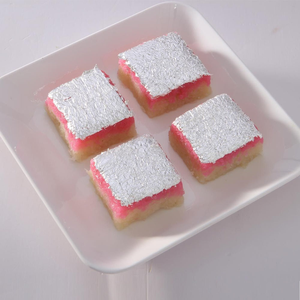 https://cdn.shopify.com/s/files/1/1857/6931/products/coconut_burfi_36_1.jpg?v=1623154767