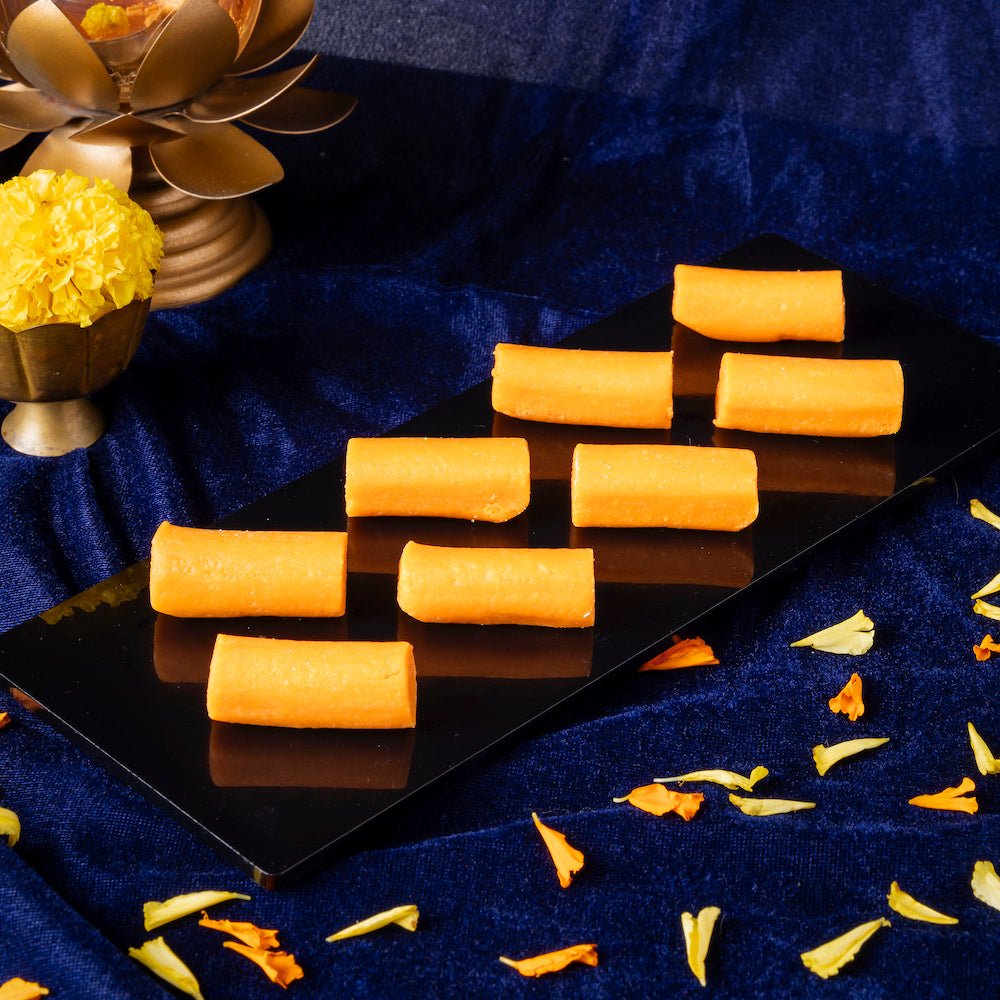 https://cdn.shopify.com/s/files/1/1857/6931/files/kaju-orange-roll-463347.jpg?v=1762168566