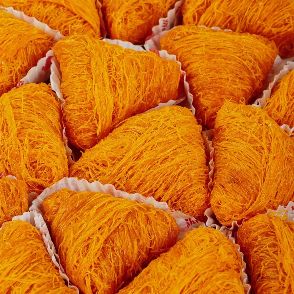 https://cdn.shopify.com/s/files/1/1857/6931/files/kesar-samosa-kunafa-5176409.jpg?v=1762168741