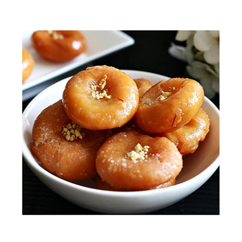 https://cdn.shopify.com/s/files/1/1857/6931/products/0001030_ghee-badusha-1-kg_510.png?v=1738308162