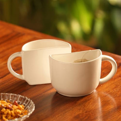 Image 2 of White for the product ExclusiveLane Unique Half Ceramic Tea Cups Set of 2 (130 ML)