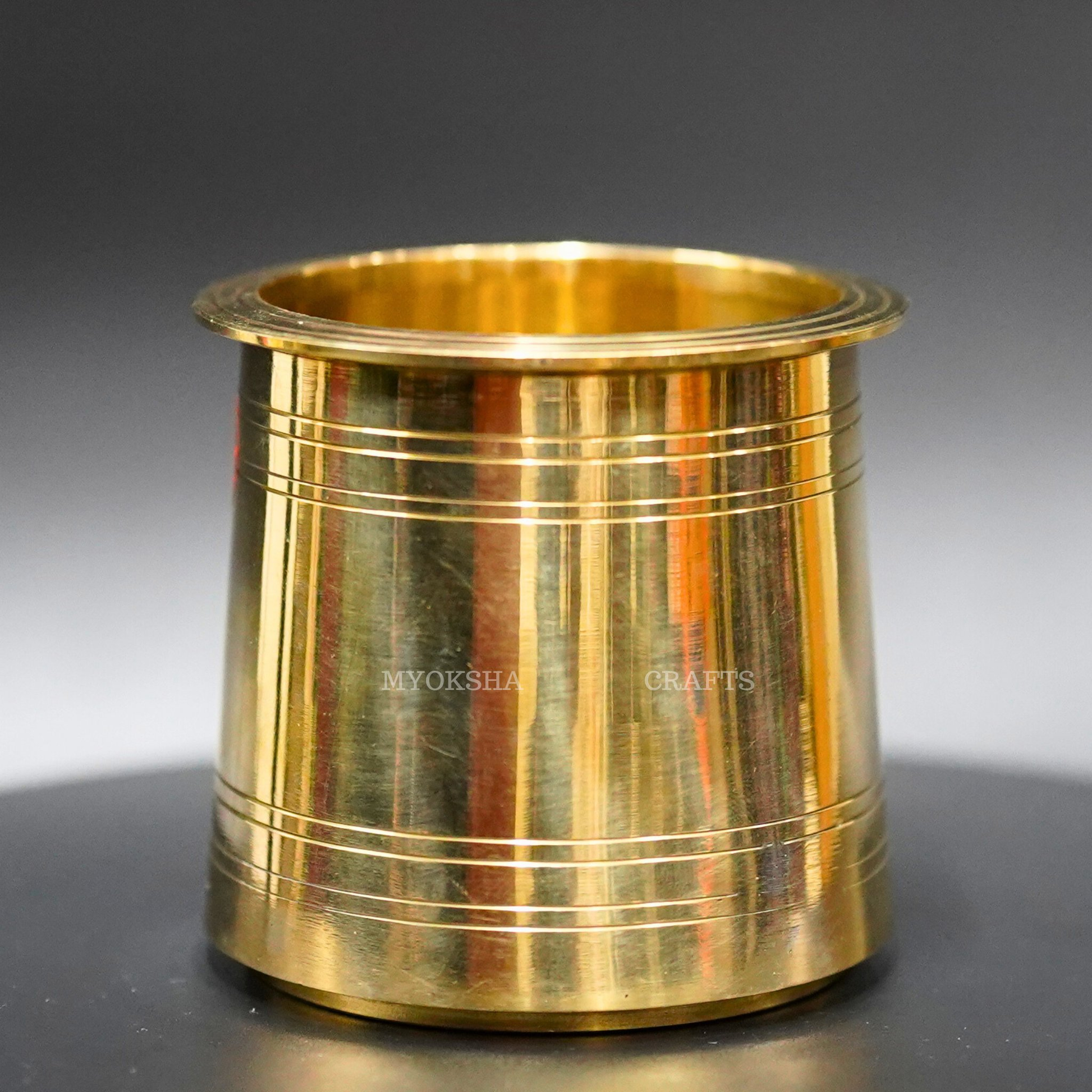 https://cdn.shopify.com/s/files/1/1857/6931/products/1689232862797_brass_panchpatra_MC00098_282_29.png?v=1753183430