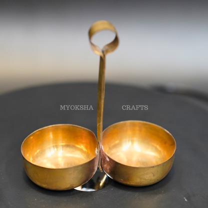 https://cdn.shopify.com/s/files/1/1857/6931/products/1690352017410_bs_haldi_26_kumkum_holder_MC00217.png?v=1753183226