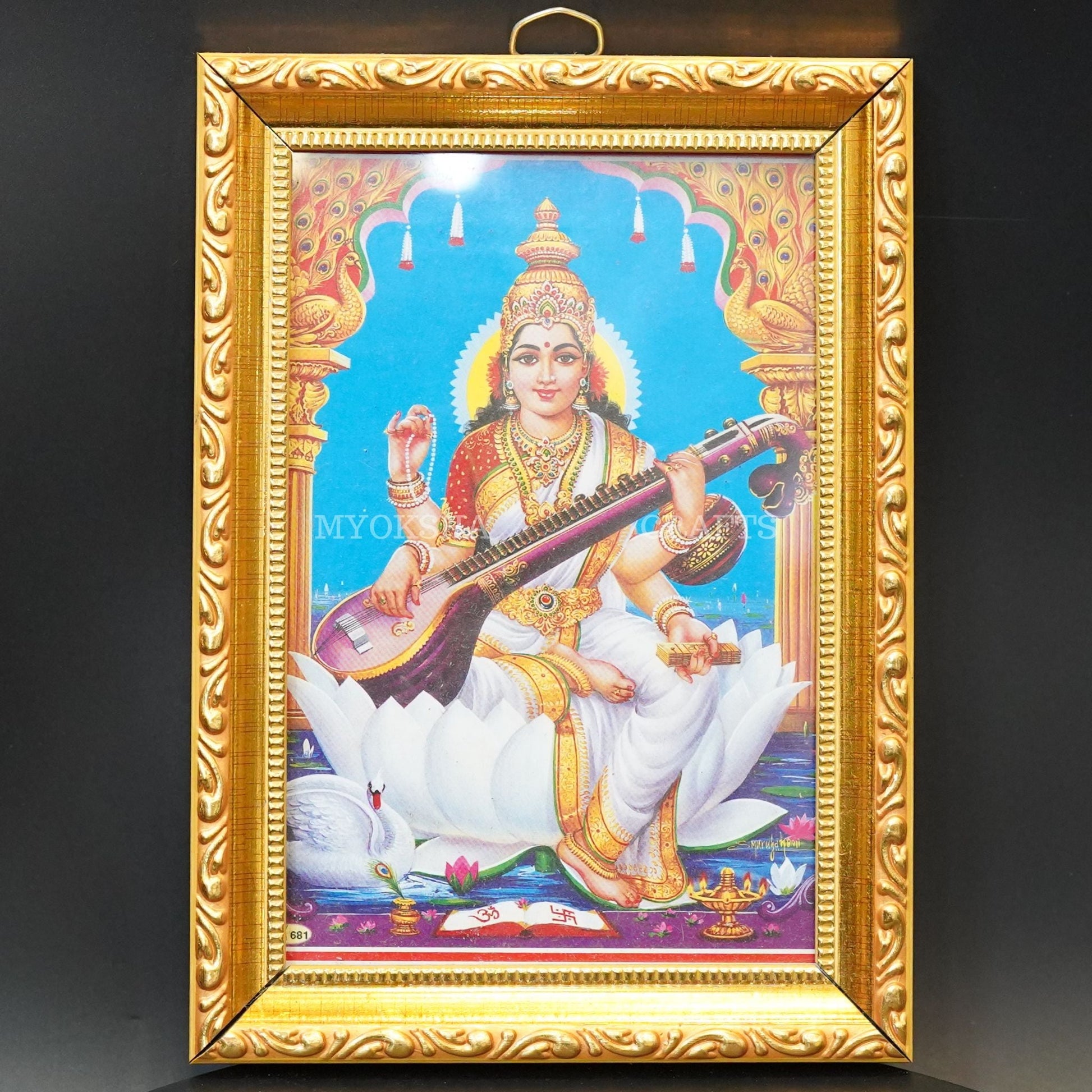 https://cdn.shopify.com/s/files/1/1857/6931/products/1690993951674_saraswati_photo_frame_MC00300.png?v=1762392818
