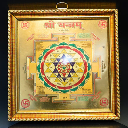 https://cdn.shopify.com/s/files/1/1857/6931/products/1690997636499_shree_yantra_frame_MC00306.png?v=1759456548