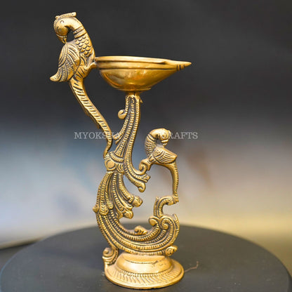 https://cdn.shopify.com/s/files/1/1857/6931/products/1692605363461_peacock_diya_MC00315.png?v=1697290235