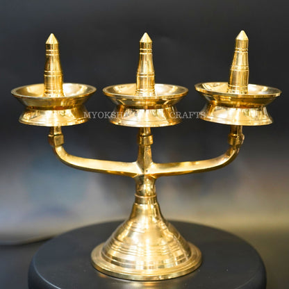https://cdn.shopify.com/s/files/1/1857/6931/products/1692610568260_thrikal_diya_MC00321.png?v=1697290874