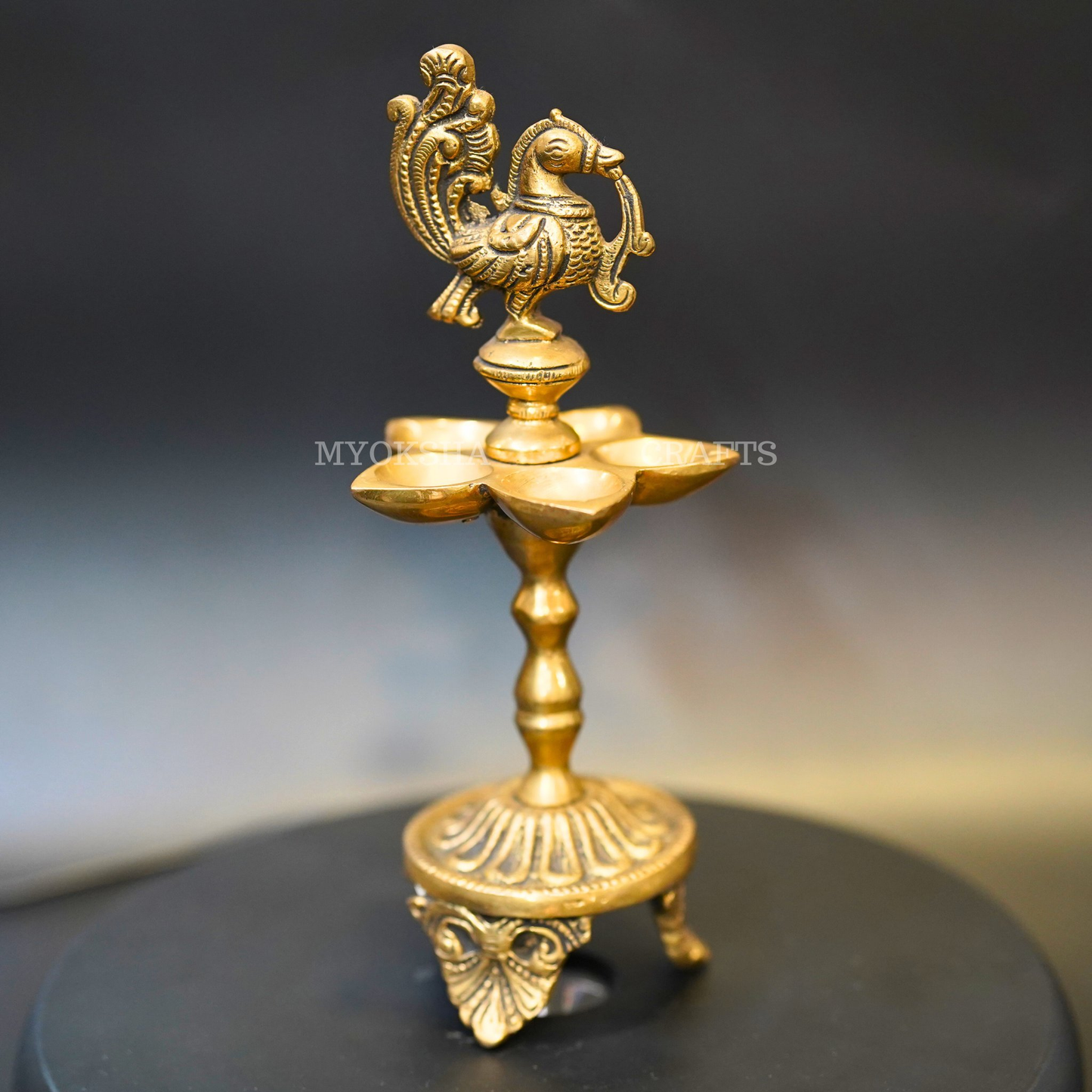 https://cdn.shopify.com/s/files/1/1857/6931/products/1692683371982_peacock_five_oil_wick_diya_MC00323.png?v=1753181952
