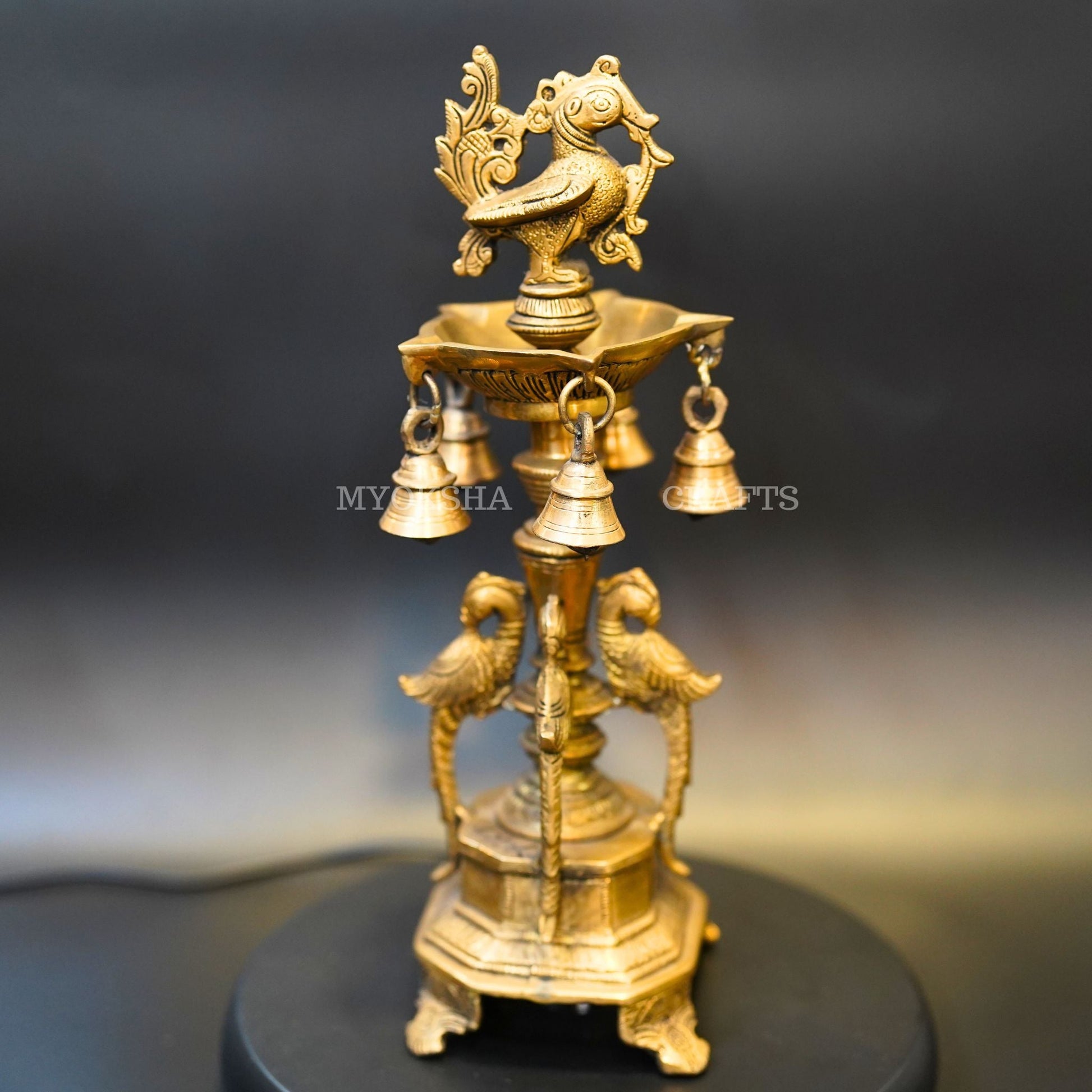 https://cdn.shopify.com/s/files/1/1857/6931/products/1692690372297_peacock_vth_bell_diya_MC00333.png?v=1697290239
