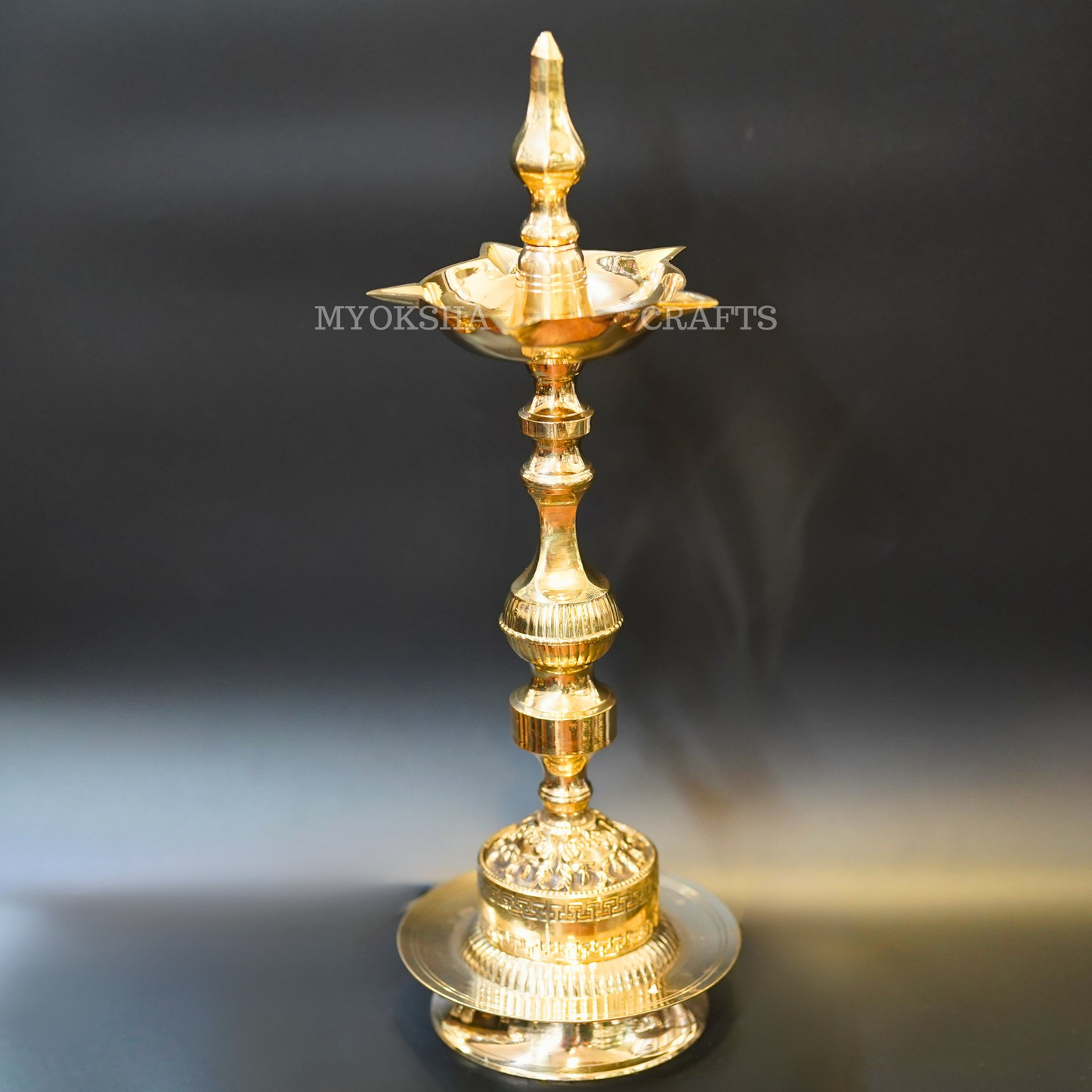 https://cdn.shopify.com/s/files/1/1857/6931/products/1692691849132_kerala_diya_MC00335.png?v=1753172856