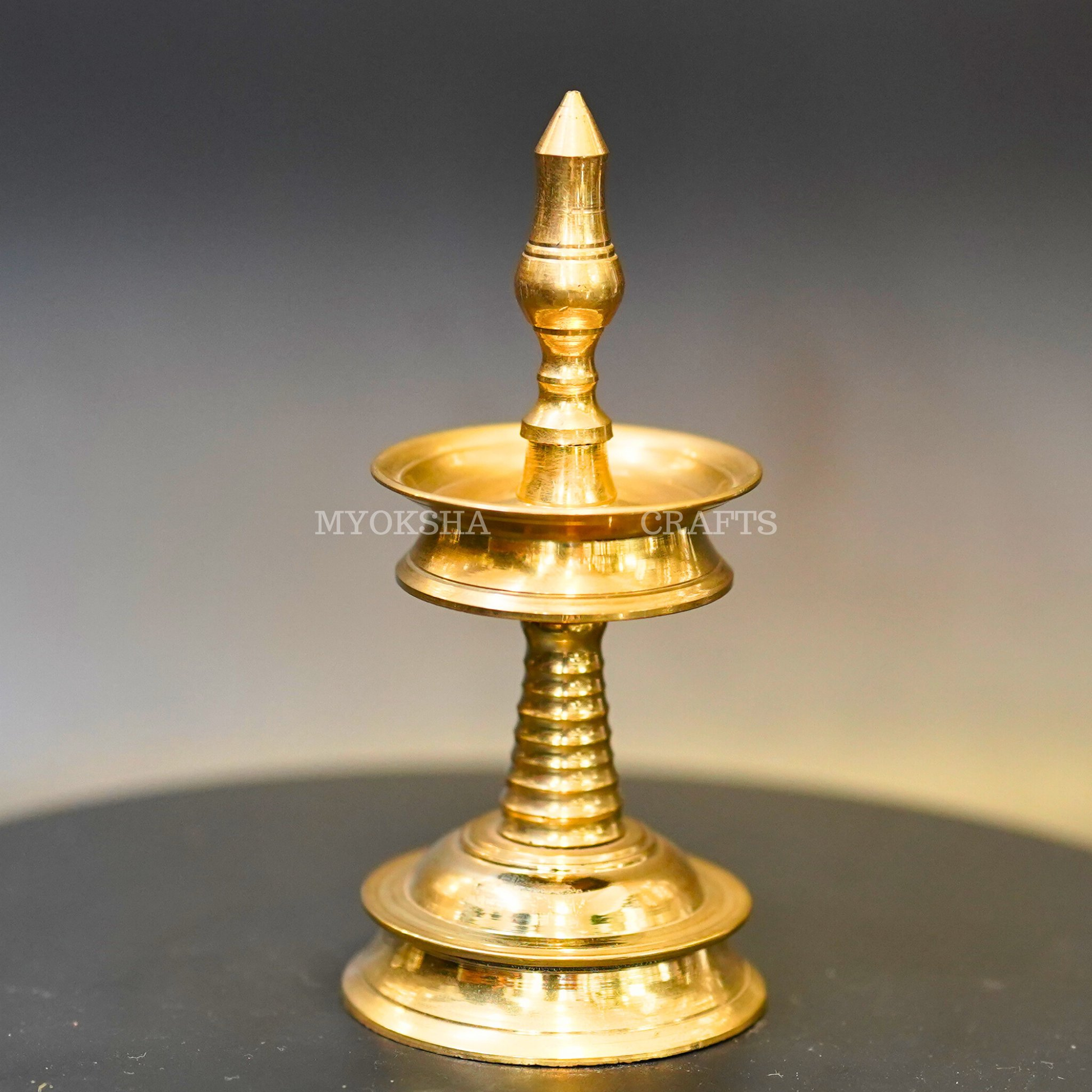https://cdn.shopify.com/s/files/1/1857/6931/products/1692711919705_kerala_diya_MC00342.png?v=1753181944