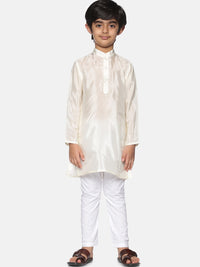 https://cdn.shopify.com/s/files/1/1857/6931/products/21ef6f29-ca77-44fa-a23a-ca5fdf31e0a31639988017661SethukrishnaBoysCream-ColouredEmpireKurtawithPyjamas1.jpg?v=1661581988