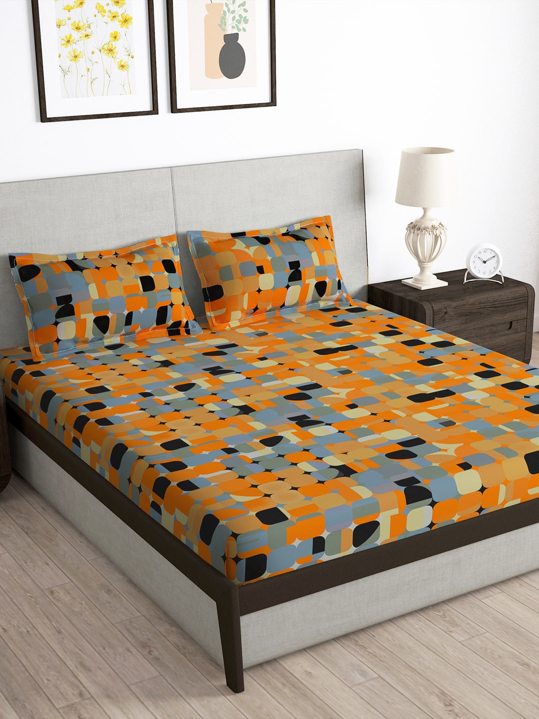 https://cdn.shopify.com/s/files/1/1857/6931/products/32b814f8-32c7-4511-8db2-e0c82809b0141685959403521-Storyhome-Arena-Rust--Purple-Printed-180-TC-Queen-Bedsheet---1.jpg?v=1703164084