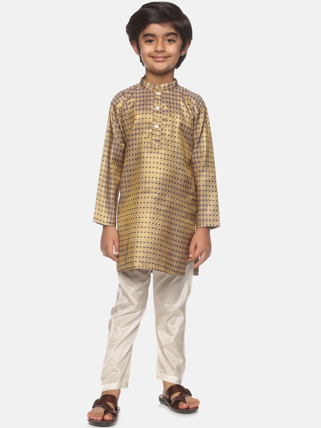 https://cdn.shopify.com/s/files/1/1857/6931/products/3395698d-7df6-4fad-a599-98d070fc208f1646282324067SethukrishnaBoysGold-TonedPrintedKurtiwithPyjamas1.jpg?v=1661583058