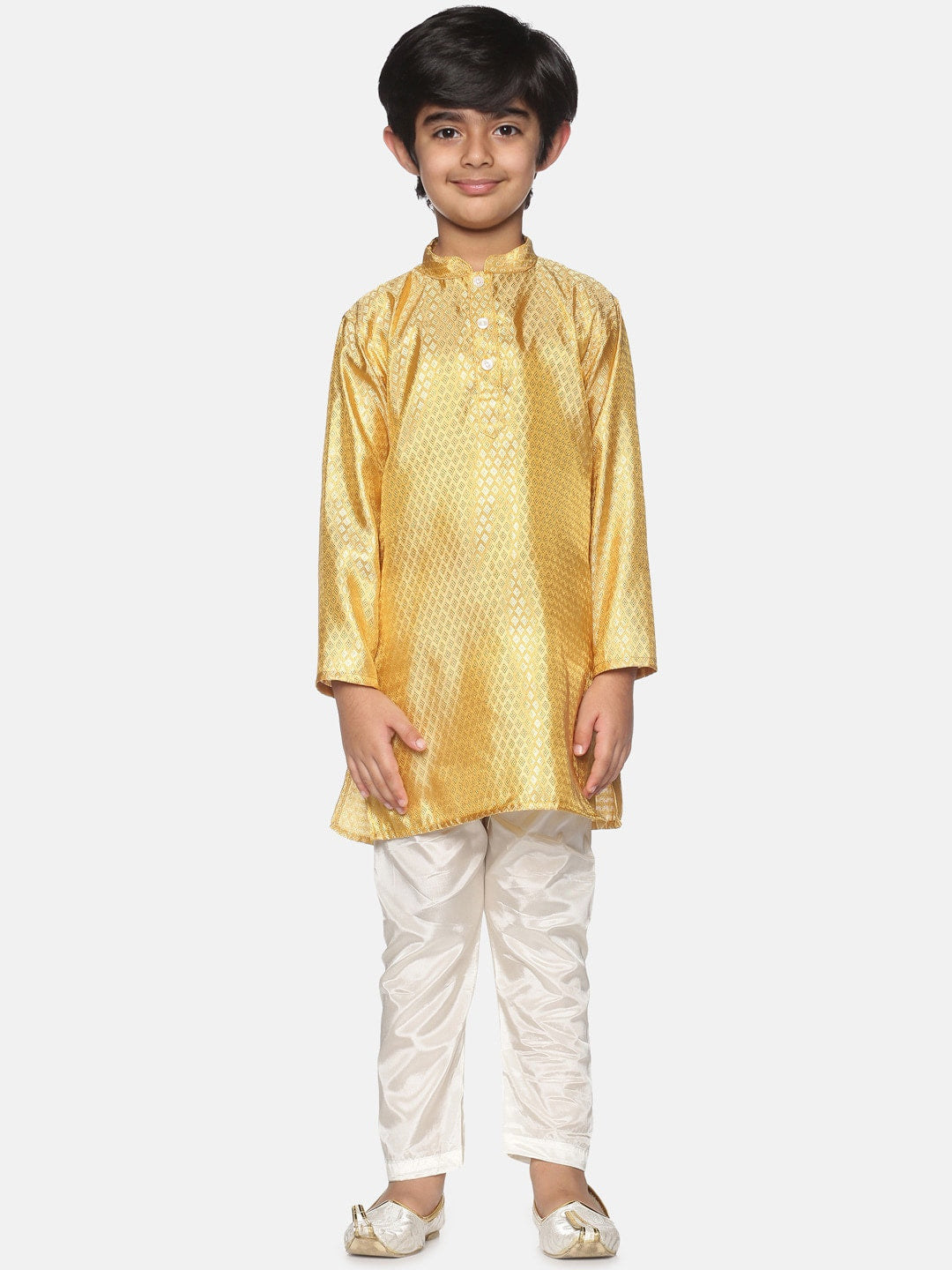https://cdn.shopify.com/s/files/1/1857/6931/products/3d935149-5bfc-43f6-81c1-762ecc5082ee1639986761147SethukrishnaBoysGold-TonedKurtawithPyjamas1.jpg?v=1661584227