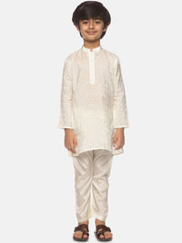 https://cdn.shopify.com/s/files/1/1857/6931/products/48e1ca08-fece-48b2-8052-796ce54676a41646226943696SethukrishnaBoysCream-ColouredKurtawithPyjamas1.jpg?v=1661576221