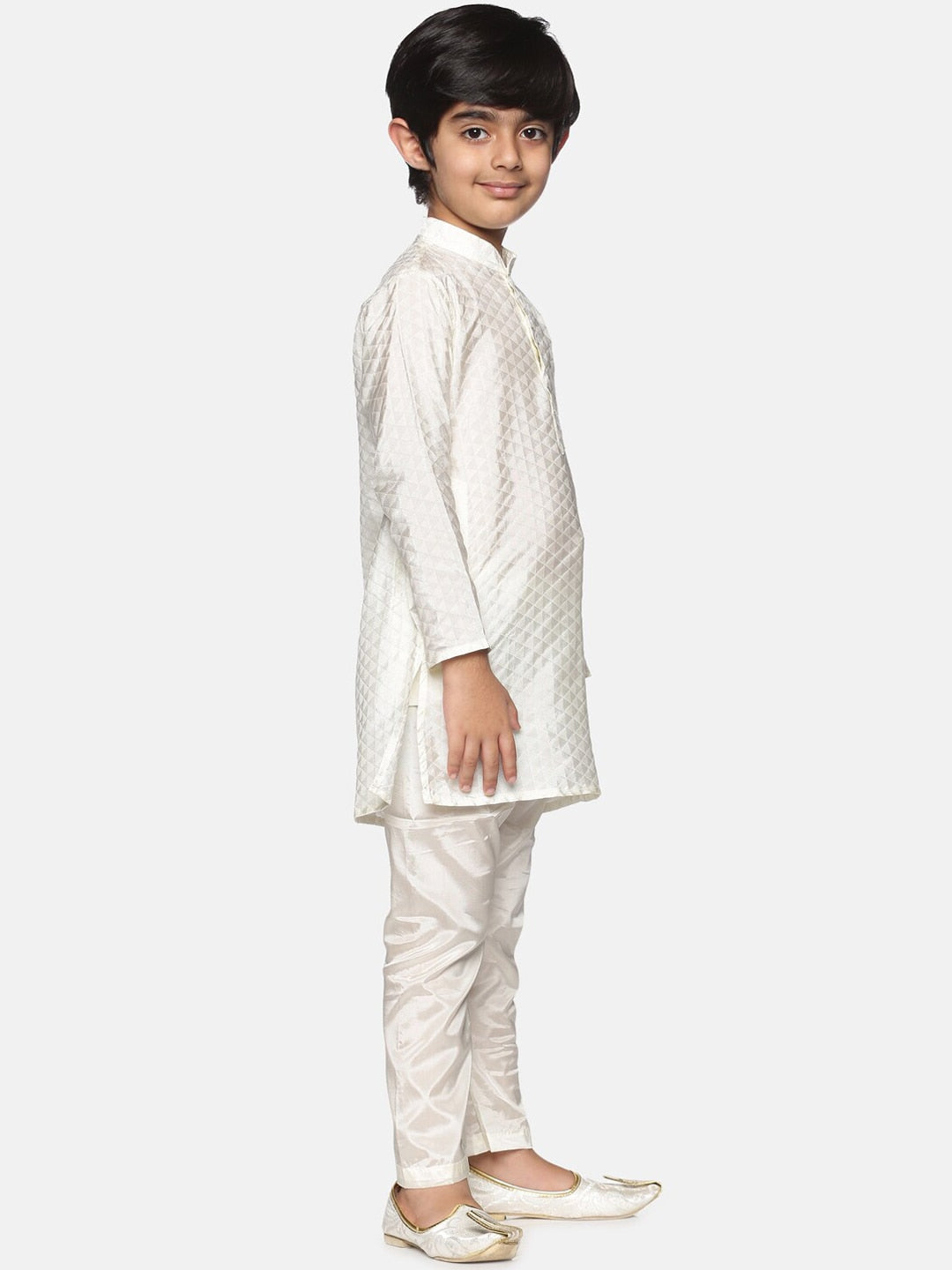 https://cdn.shopify.com/s/files/1/1857/6931/products/50beb3de-7283-4c65-ac31-0f006e7120951639986333526SethukrishnaBoysCream-ColouredKurtawithPyjamas4.jpg?v=1661582051