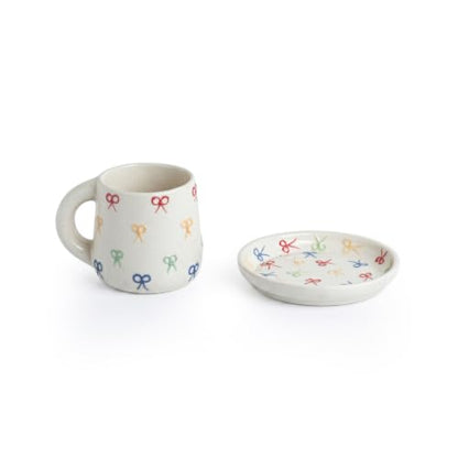 Image 3 of ExclusiveLane Ribbon Bow Hand Embossed Ceramic Tea Cup with Saucer Set of 2 335 ml Microwave Safe
