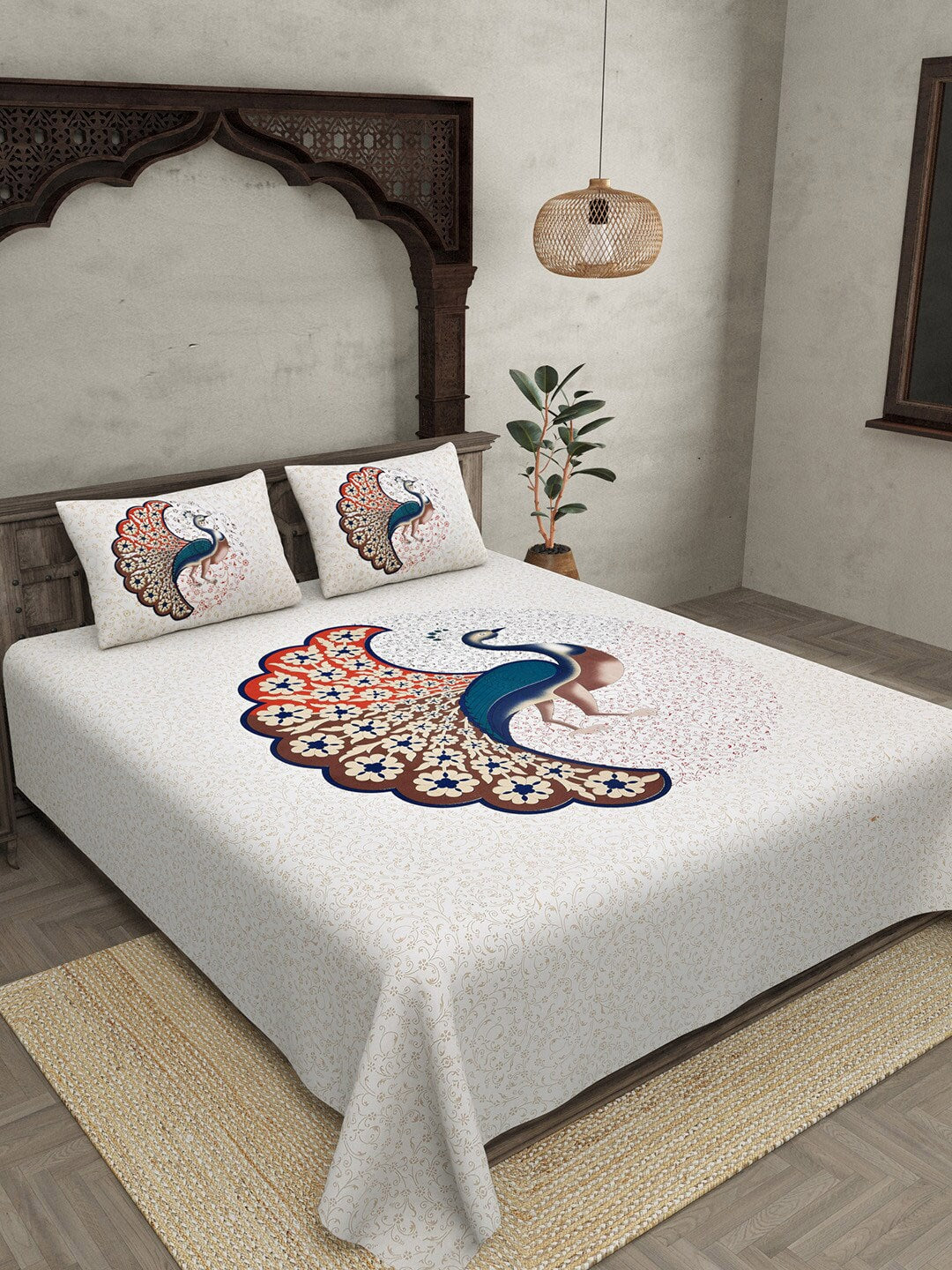 https://cdn.shopify.com/s/files/1/1857/6931/products/52a72b0e-e91d-4296-869c-a01270ce985a1670933436111JAIPURFABRICWhiteRedEthnicMotifsKingBedsheetwith2PillowCover3.jpg?v=1703311725