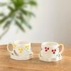 Image 1 of Default Title for the product ExclusiveLane Sunbeam Bloom Hand-Painted Ceramic Tea Cup with Saucer Set of 2