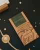 Image 1 of Default Title for the product KOKOMAE Rakhi Gift Butterscotch Nuggets Coated in Premium Dark Chocolate 50g