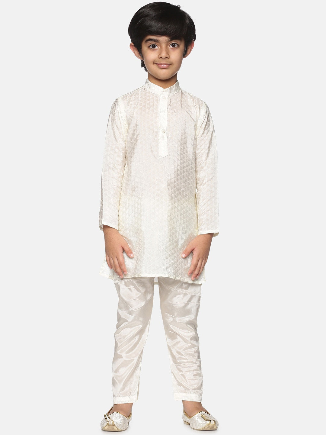 https://cdn.shopify.com/s/files/1/1857/6931/products/906c0368-1f78-47c8-b209-b417cca7bcc31639986333327SethukrishnaBoysCream-ColouredKurtawithPyjamas1.jpg?v=1661582051