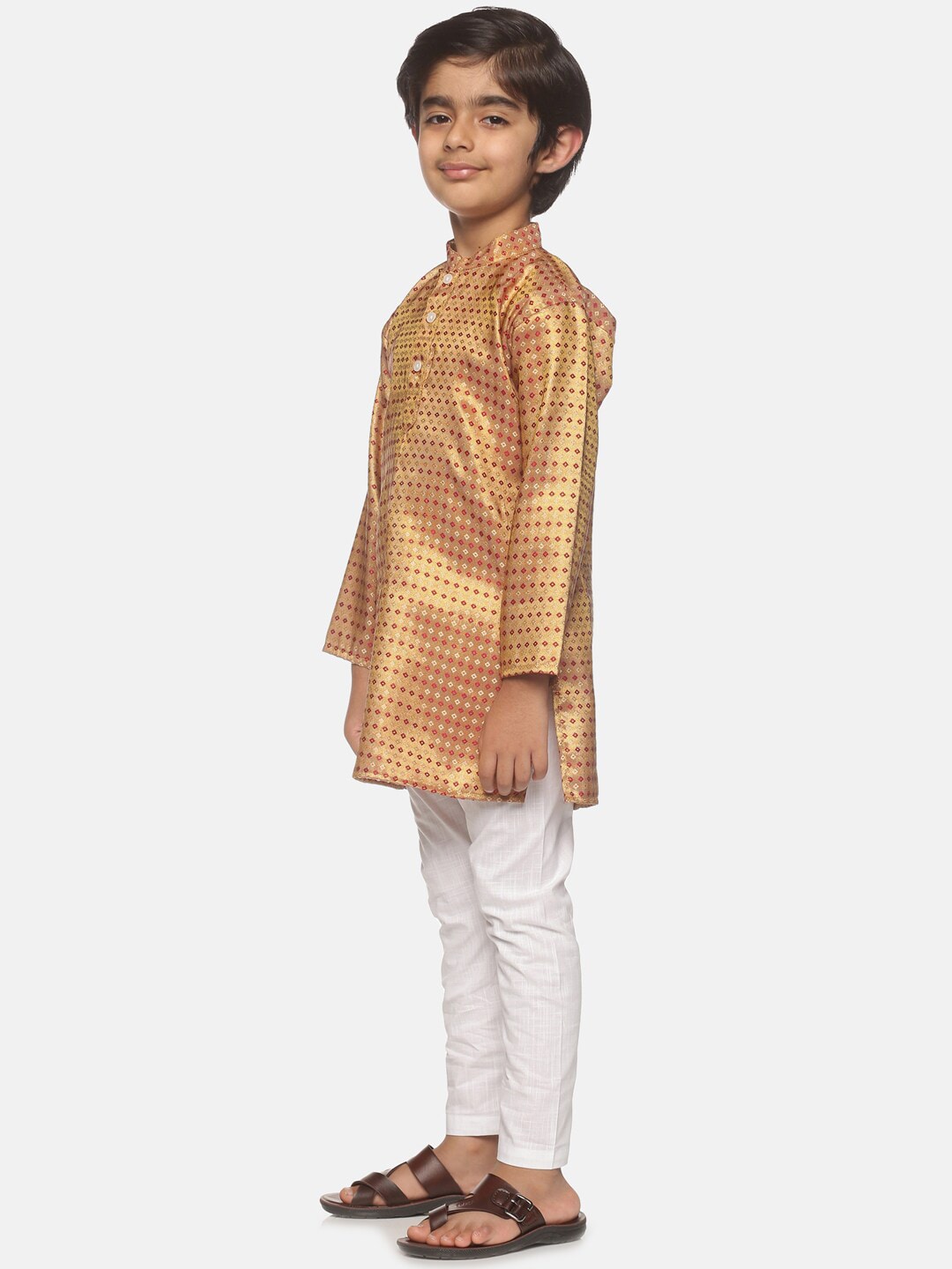 https://cdn.shopify.com/s/files/1/1857/6931/products/93815576-9878-4433-bdb2-f032487270271646225988472SethukrishnaBoysGold-TonedPrintedKurtiwithPyjamas4.jpg?v=1661584326