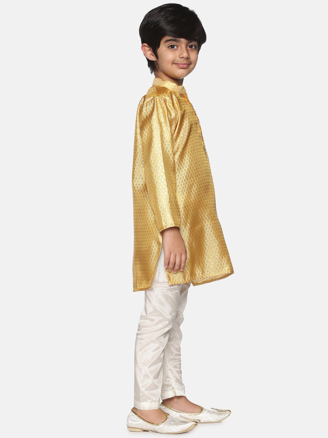 https://cdn.shopify.com/s/files/1/1857/6931/products/9e453837-52b4-462f-a584-739752df2f0f1639986761362SethukrishnaBoysGold-TonedKurtawithPyjamas4.jpg?v=1661584227