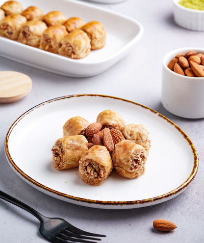https://cdn.shopify.com/s/files/1/1857/6931/files/AlmondBaklava_1_1.png?v=1762321710