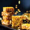 https://cdn.shopify.com/s/files/1/1857/6931/files/AlmondHousePoha_BhelChikkis0201-1_2_1.jpg?v=1765198899