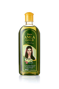 https://cdn.shopify.com/s/files/1/1857/6931/products/AmlaGoldHairOil.jpg?v=1619605941