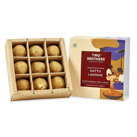 https://cdn.shopify.com/s/files/1/1857/6931/products/AmorearthSattuLaddu1.jpg?v=1626957431