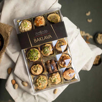 https://cdn.shopify.com/s/files/1/1857/6931/files/AssortedBaklava15pcs.1jpg_e5a588d6-5f46-42d6-8976-8b32b004bc72.webp?v=1759476220