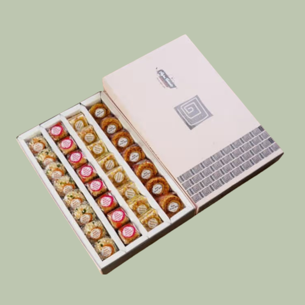 https://cdn.shopify.com/s/files/1/1857/6931/files/BakeBadamAssortment.png?v=1784886931