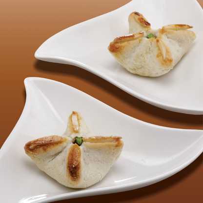 https://cdn.shopify.com/s/files/1/1857/6931/files/BakeBadamPotli.png?v=1784886918