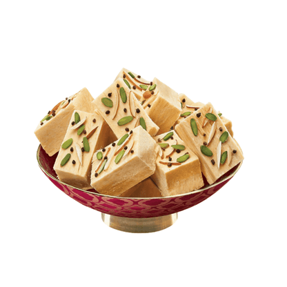 https://cdn.shopify.com/s/files/1/1857/6931/products/Bikano-Soan-Papdi-500gm.png?v=1604067413