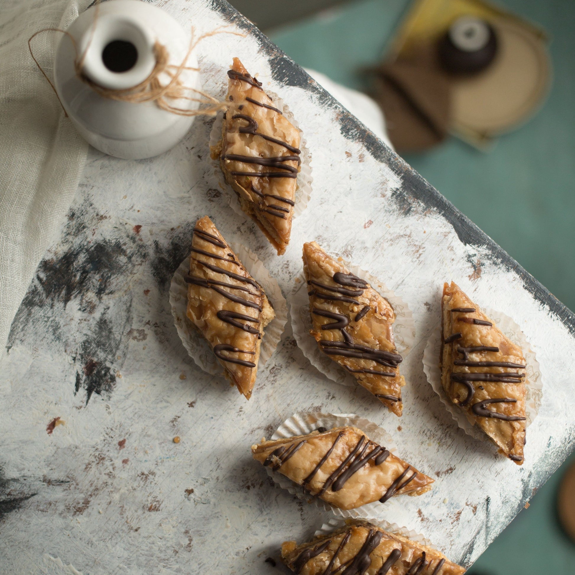 https://cdn.shopify.com/s/files/1/1857/6931/files/CHOCOLATELAYEREDBAKLAVA.jpg?v=1765199259