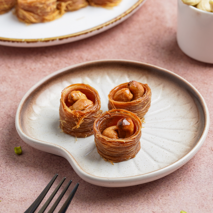 https://cdn.shopify.com/s/files/1/1857/6931/files/CashewNest01_1e677e00-89ec-4134-85e7-536422adf0cf.png?v=1762321817