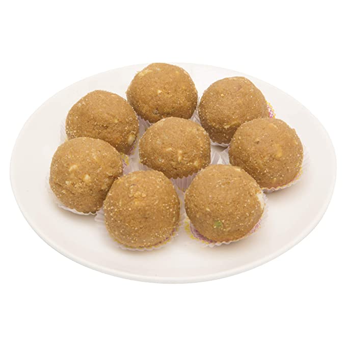 https://cdn.shopify.com/s/files/1/1857/6931/products/Dadu_s-BesanLaddu.jpg?v=1716379641