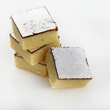 https://cdn.shopify.com/s/files/1/1857/6931/files/Dadu_s-ChocolateBurfi.jpg?v=1716902308