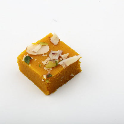 https://cdn.shopify.com/s/files/1/1857/6931/files/Dadu_s-MoongDalBurfi3.jpg?v=1716903768