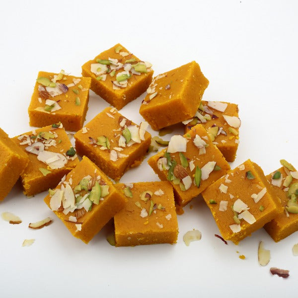 https://cdn.shopify.com/s/files/1/1857/6931/files/Dadu_s-MoongDalBurfi4.jpg?v=1716903769